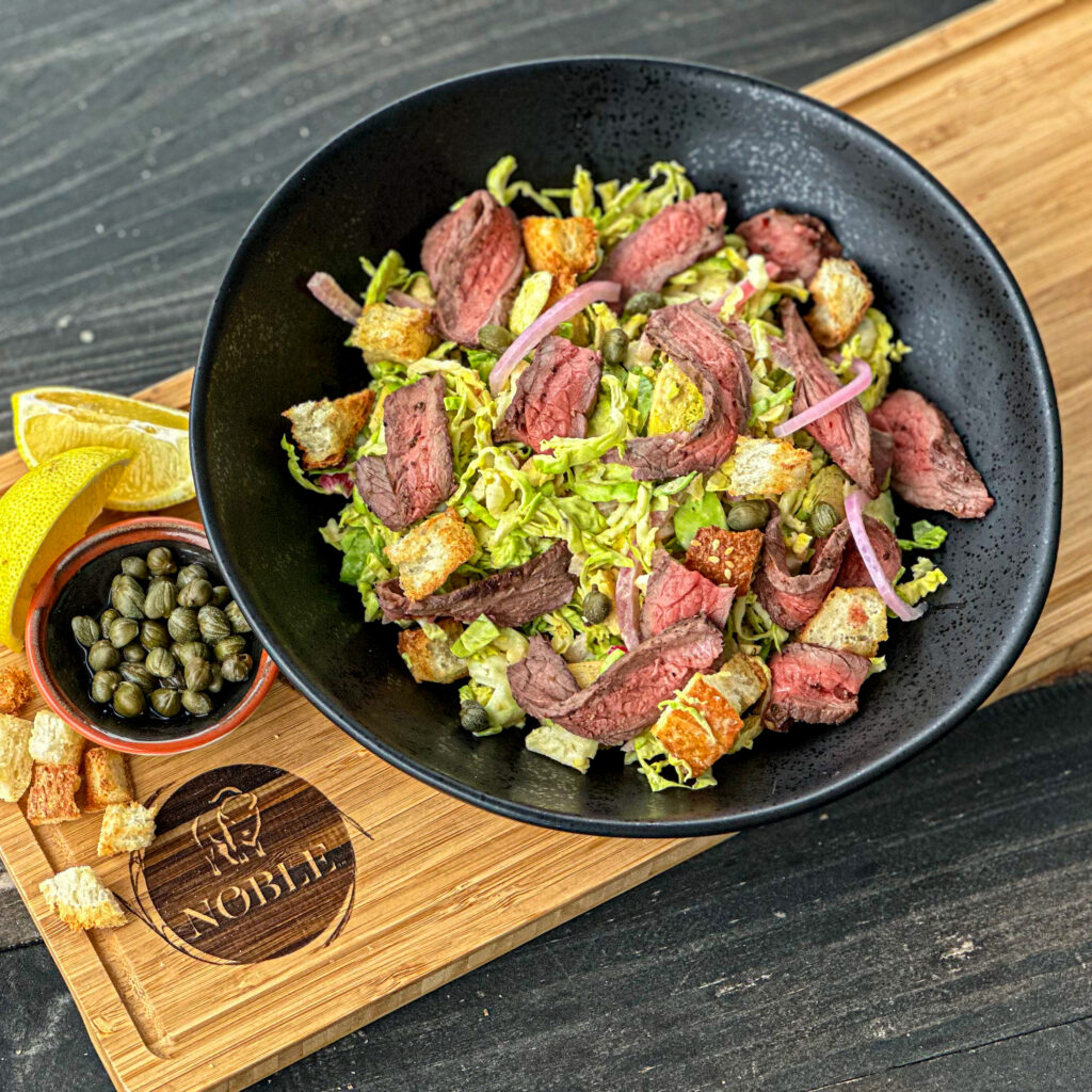 Grilled Bison & Brussels Sprouts Caesar Salad article image